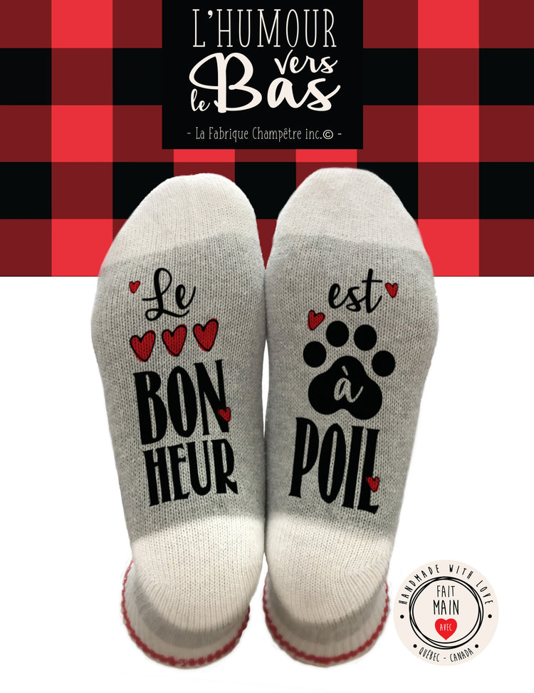 Des bas de laine humoristiques prêts pour les soirées relax. Le bonheur est à poil. Vendus chez Tah-dah !