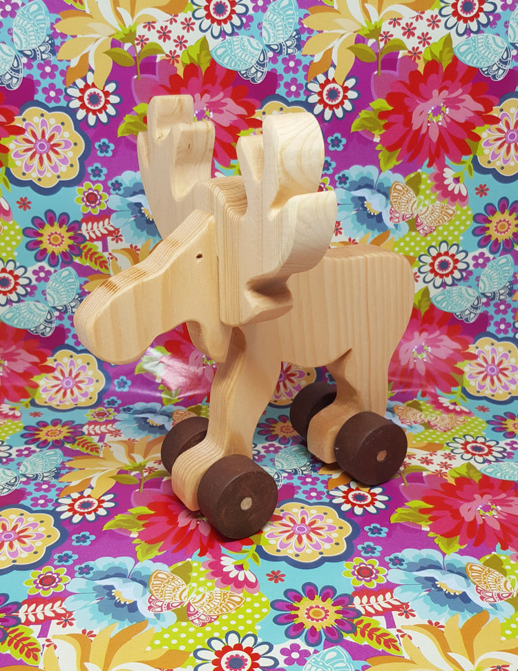 Jouet en bois orignal pour enfants. Vendu chez Tah-dah !