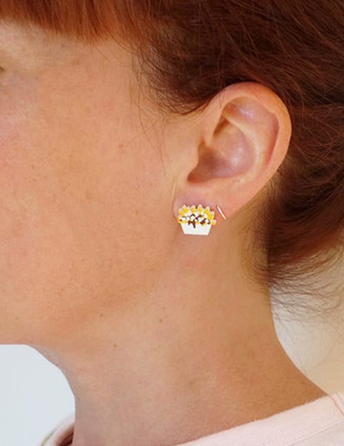 Boucles d'oreilles poutine. Vendues chez Tah-dah !