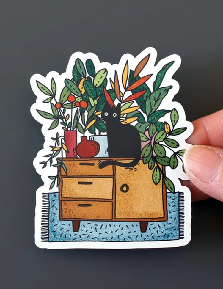 Des aimants et des autocollants pour tous les goûts ! Chat noir avec plantes. Vendus chez Tah-dah !