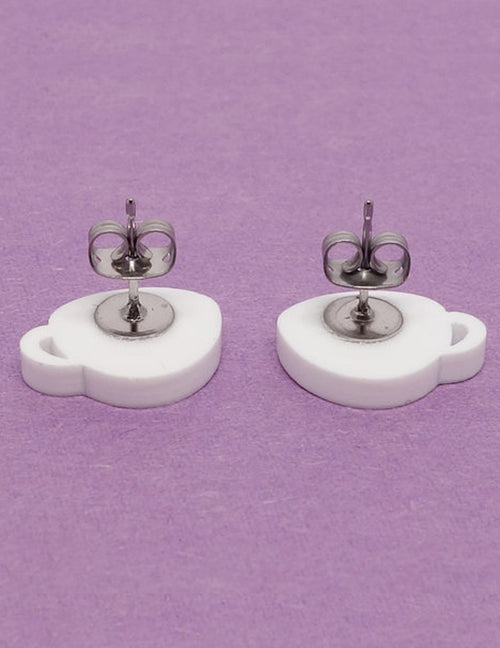 Ces boucles d'oreilles lilipop attireront des sourires! Latté. Vendues chez Tah-dah !