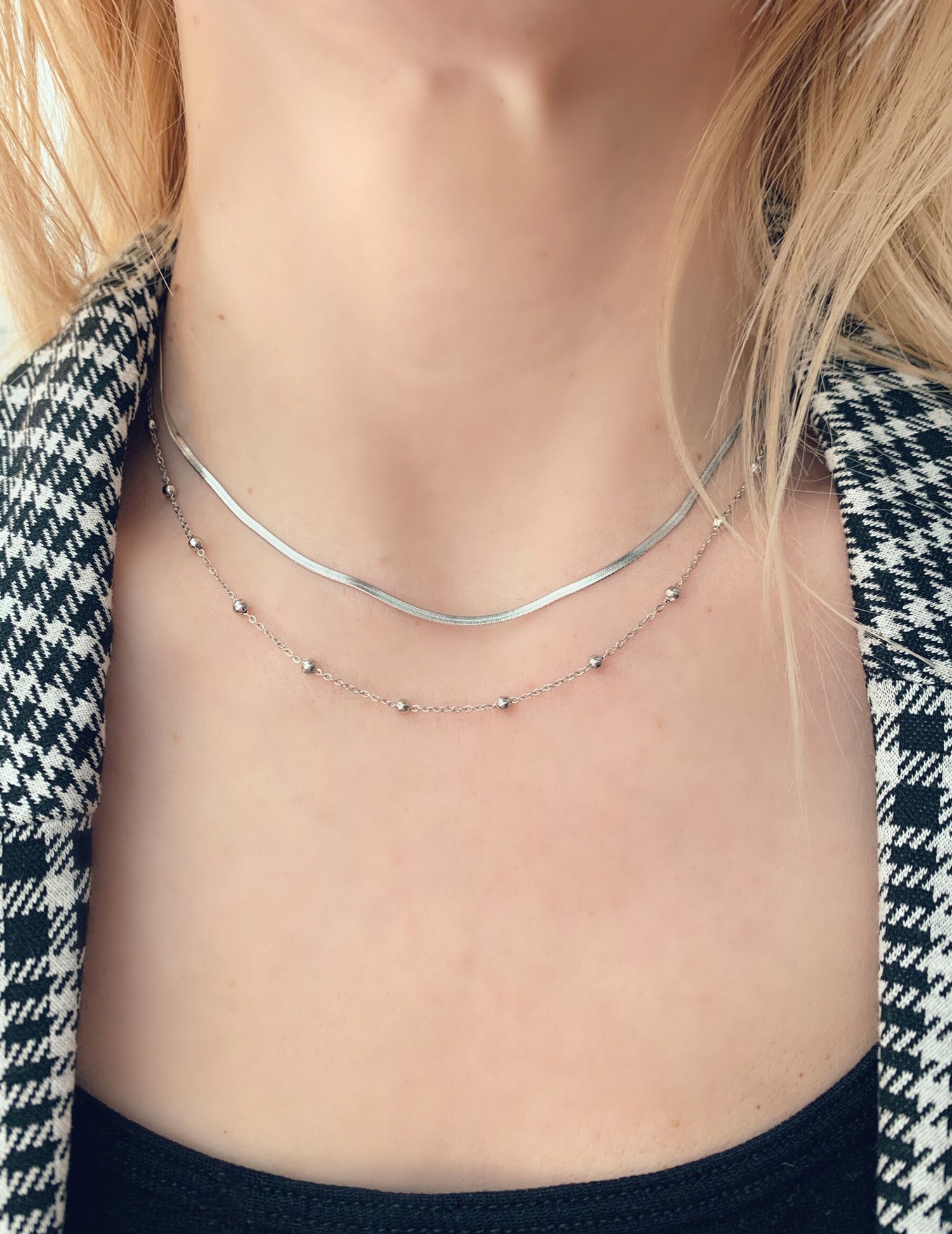 Collier lina en acier inoxydable. Vendu chez Tah-dah !