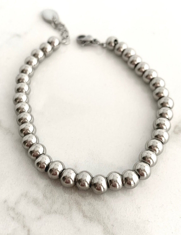 Bracelet jamie en acier inox. Vendu chez Tah-dah ! 